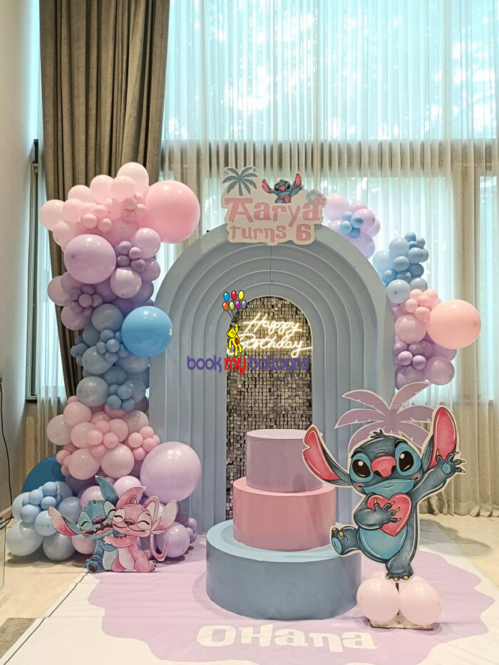 Stitch theme birthday balloon backdrop with pastel balloons and Ohana signage